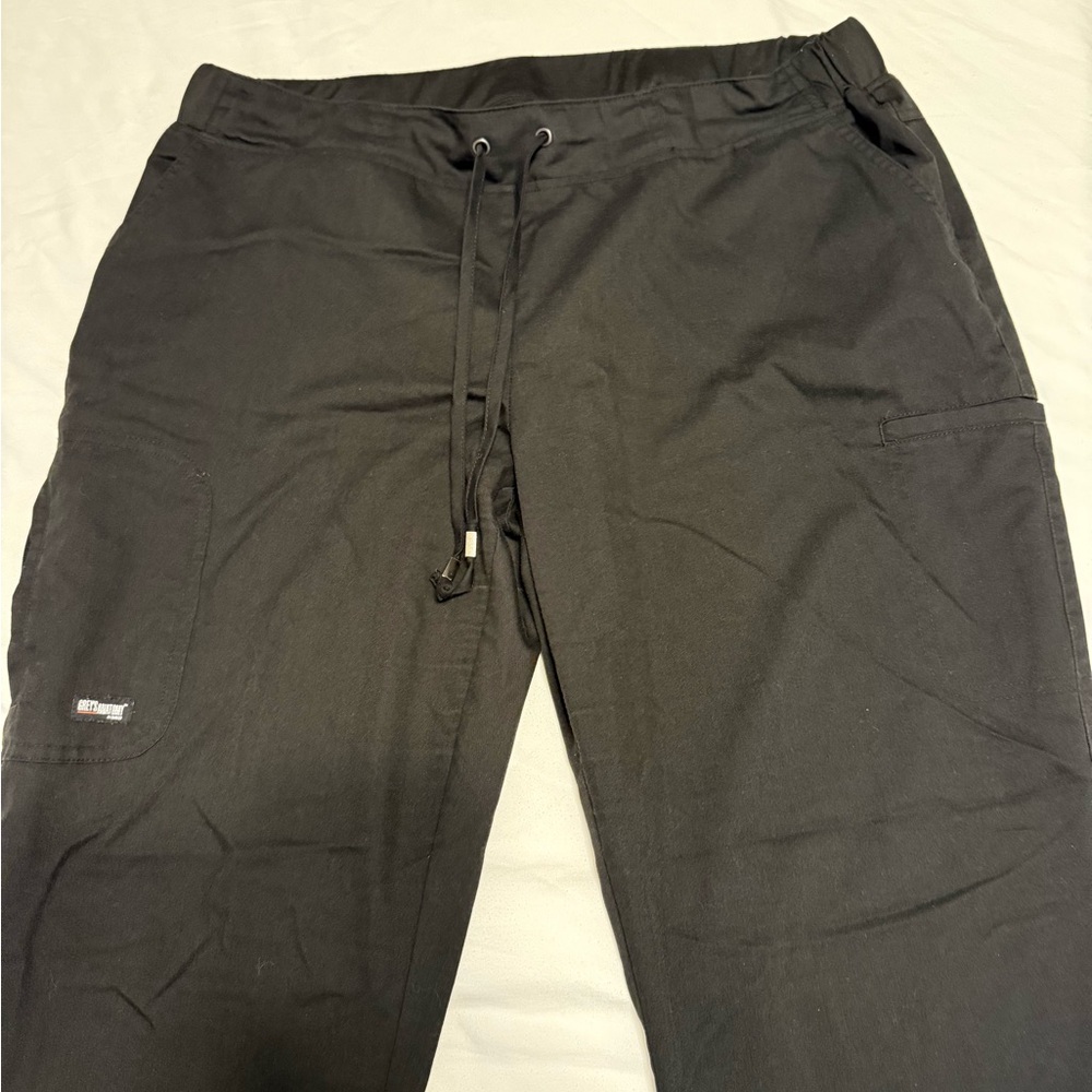 grey's anatomy	XL	black	scrub pants	small slit on bottoms, drawstring